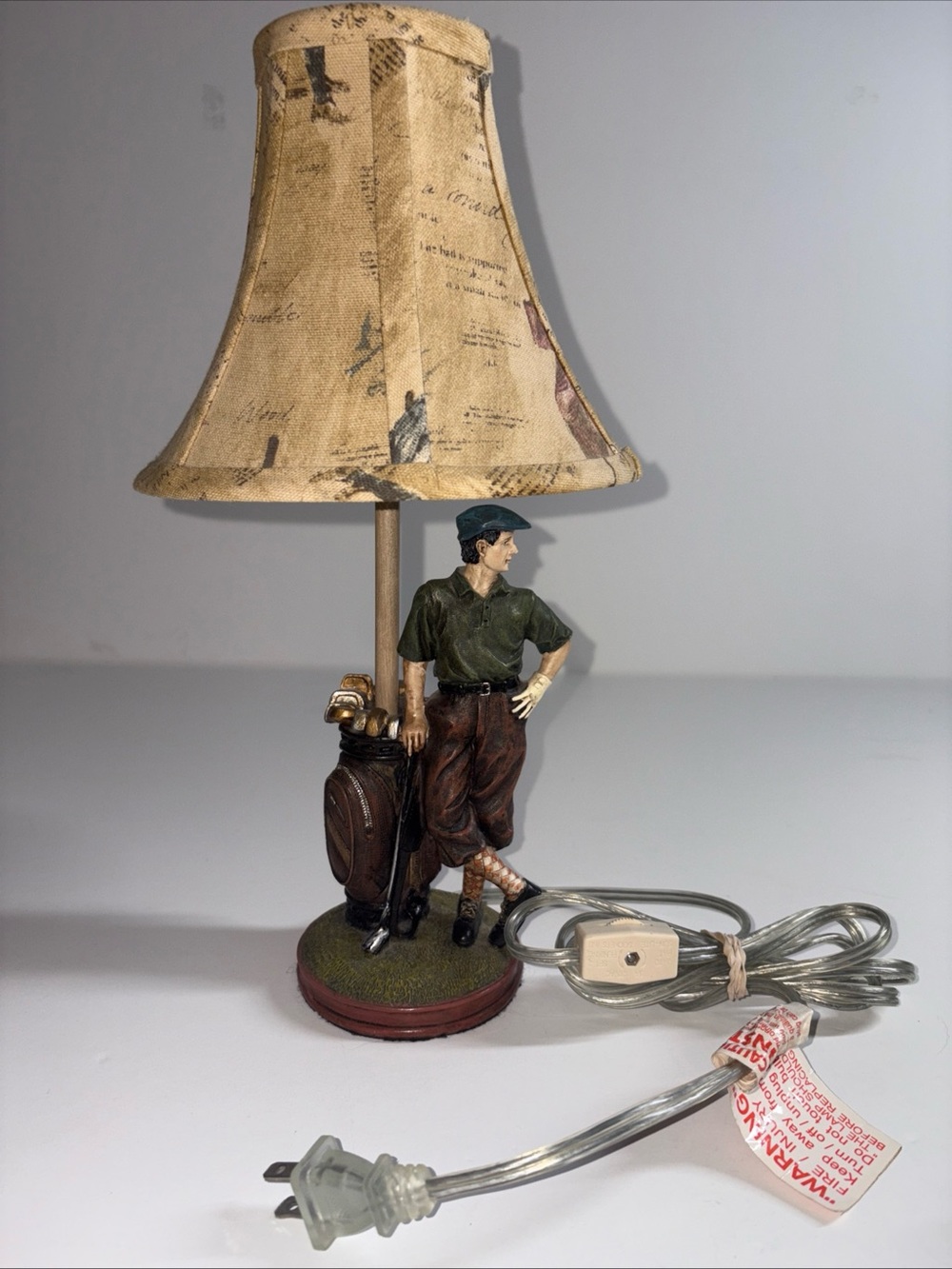 Golf-Themed Table Lamp with Beige Shade and Olive Figurine